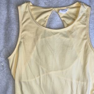 Banana yellow open back bodysuit from Lelis Collection!